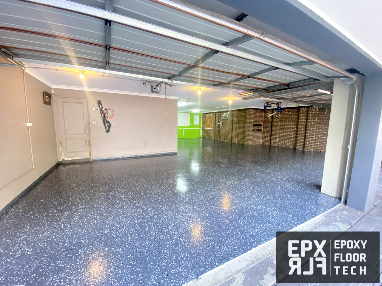 partial-premium-flake-flooring-triple-garage-dark-grey-Berowra