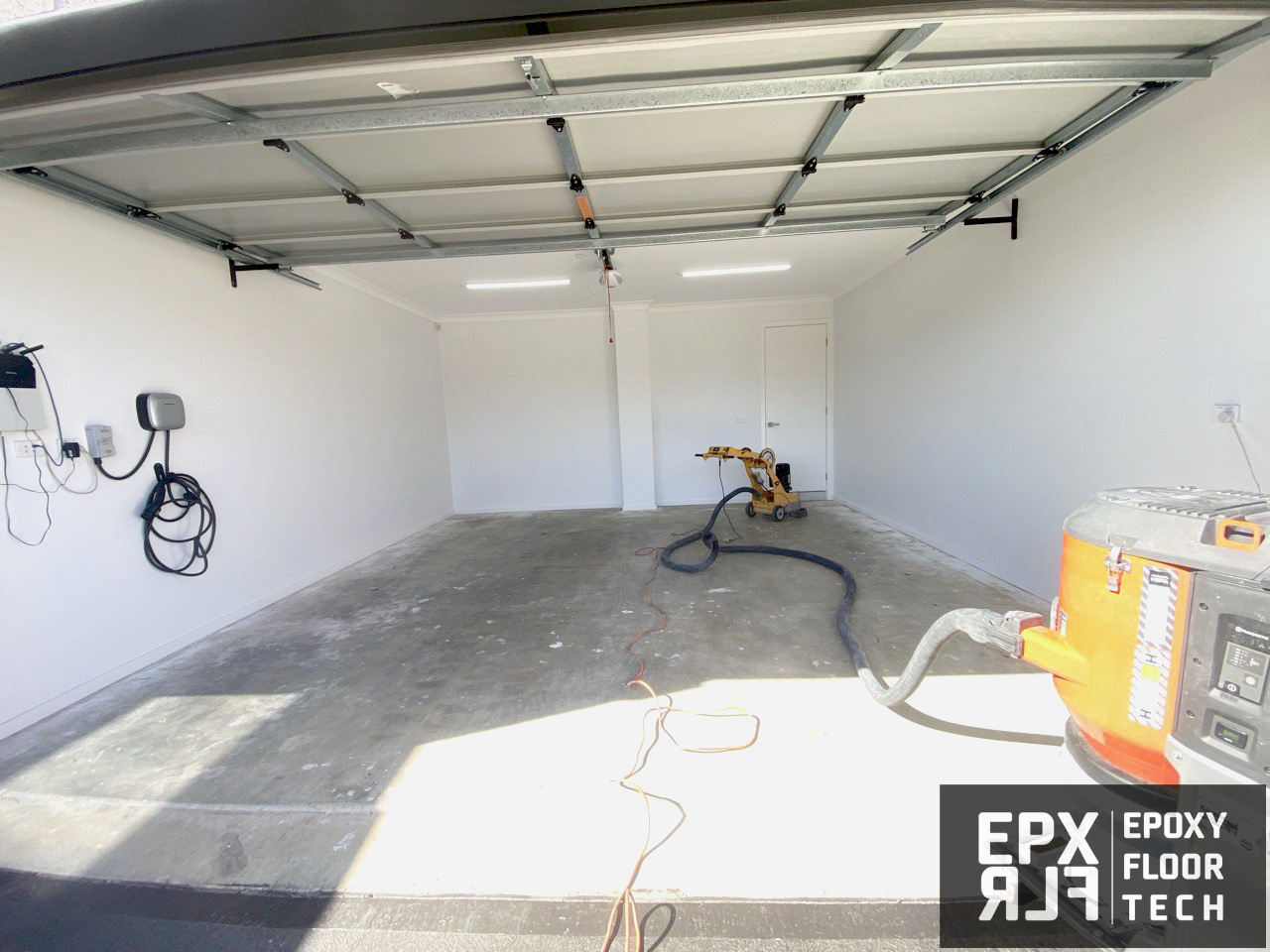 prepration-diamond-grinding-vacuuming-garage-epoxy-floor-painting